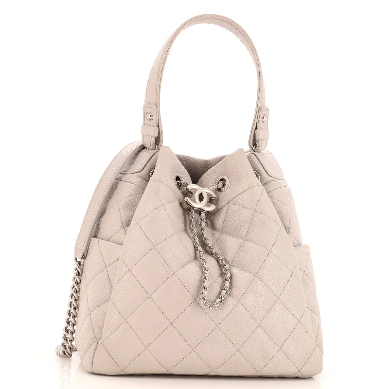 Women's bucket bag cool finish -CC Chain Drawstring Bucket Bag Quilted Caviar Small